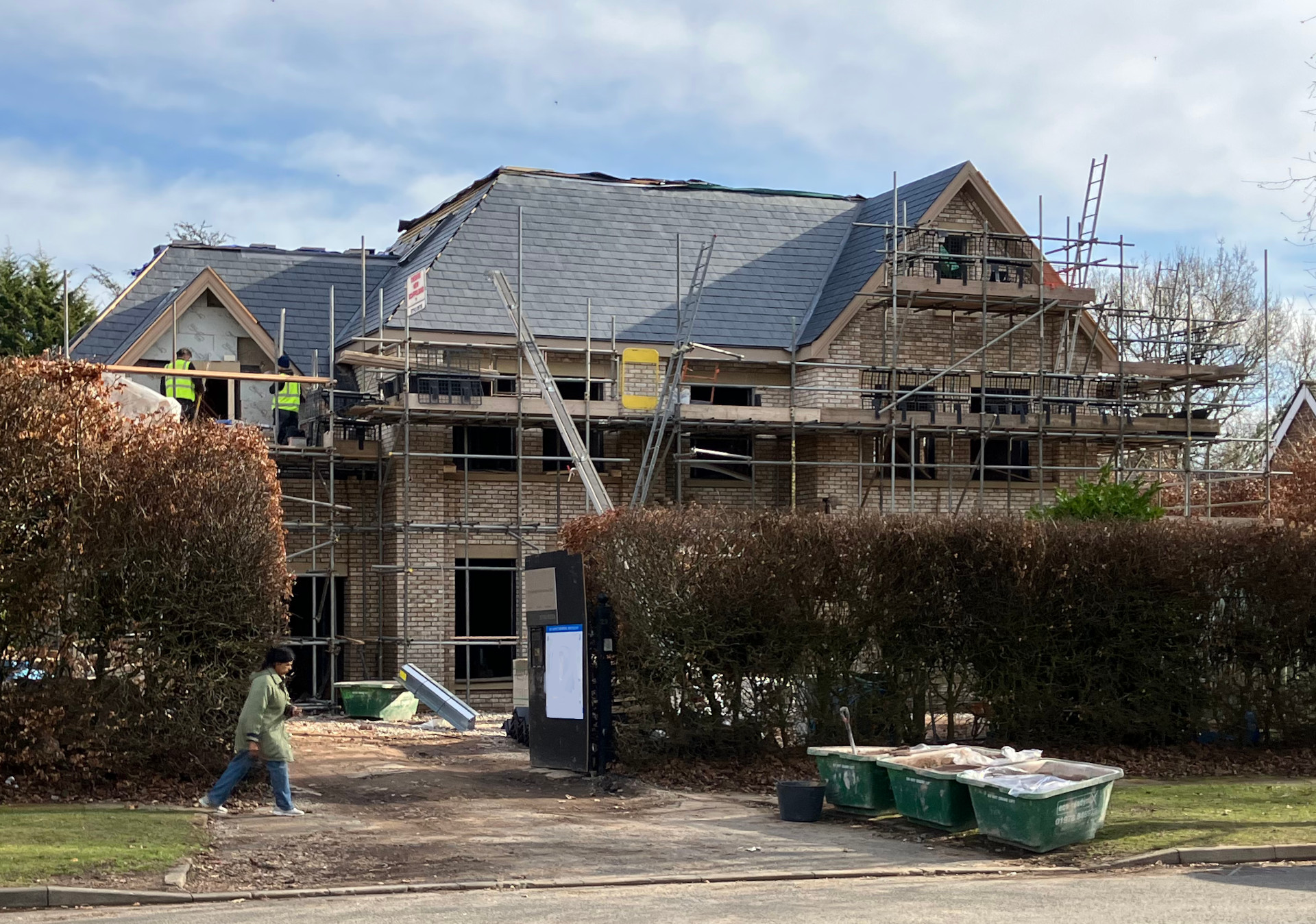 Example of new slate roof installed by Timperley Roof Repairs.