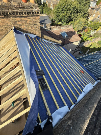 Slate and tile roof repairs in Altrincham and Timperley.